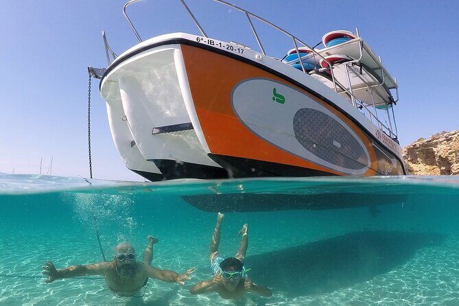 3 Hours by Boat with Paddle Surf Course, Snorkel and more - Getting on the boat in San Antonio: fast start, clear direction