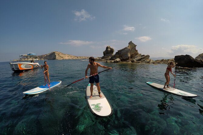 3 Hours by Boat with Paddle Surf Course, Snorkel and more - Snorkeling after SUP: calm bays and fish-filled swims