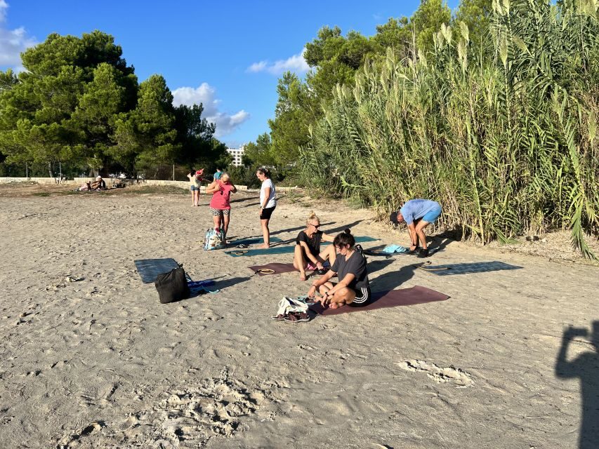 Discover Beach Yoga in San Antonio Ibiza - Timing options: Tuesday morning, Tuesday sunset, and Friday at noon