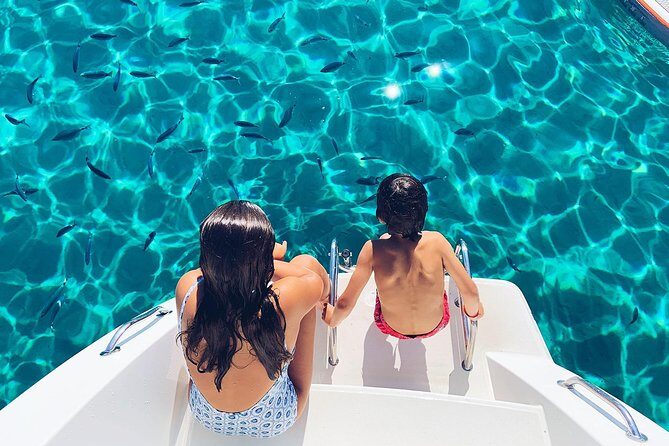 Discover Cala Bassa and Cala Comte on board a catamaran - Cala Comte’s Blue Water: A Swim Break With Big Payoff