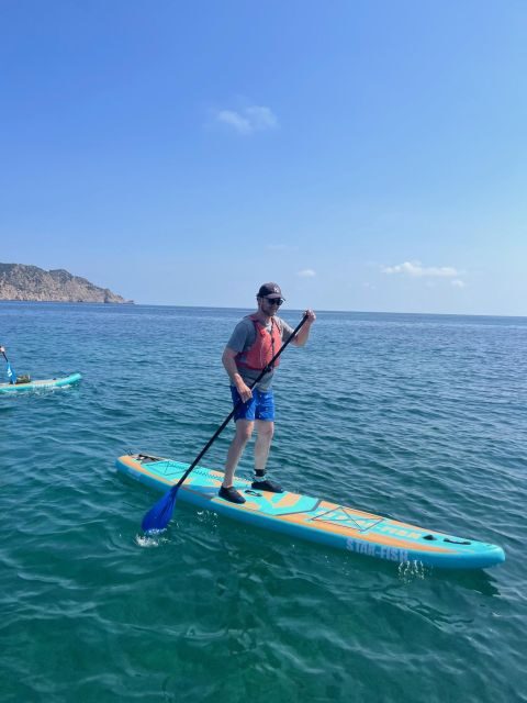 Es Figueral: Standup Paddleboarding Adventure - Sea-only beach time by s’Illot de s’Or: the part you can’t replicate on foot