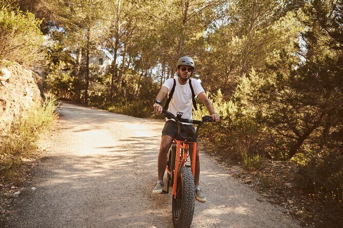 Guided Ebike Tour in Ibiza - Niu Blau: The Quieter Beach With Shade, Views, and a Swing