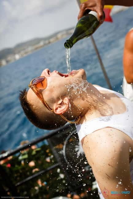 Ibiza Boat party with unlimited drinks, Brunch & pool party - Boarding the Boat Party (14:00–17:00): Open Bar, DJ Energy, and Crowd Control