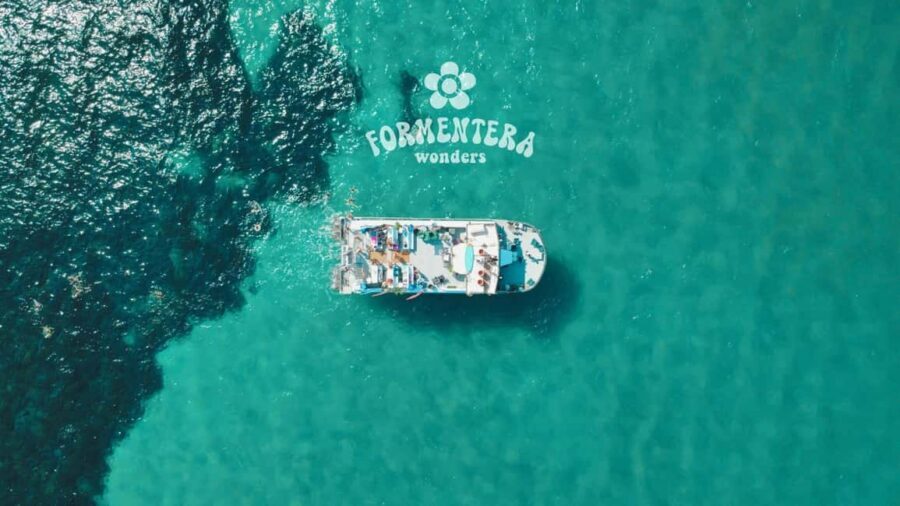 Ibiza: Boat Trip to Formentera with Open Bar and Paella - Getting on board: Happiness Beach Ibiza and the vibe on deck