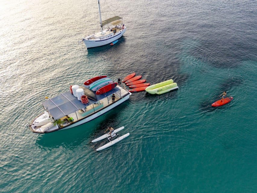 Ibiza by Sea: Coves, Caves, Water Sports & Open Bar - Setting Off From Sant Antoni de Portmany: Meet-Up Done Right