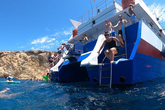 Ibiza: Es Vedrà Catamaran Cruise – Morning or Sunset - Onboard experience: free bar, music energy, and fun at sunset