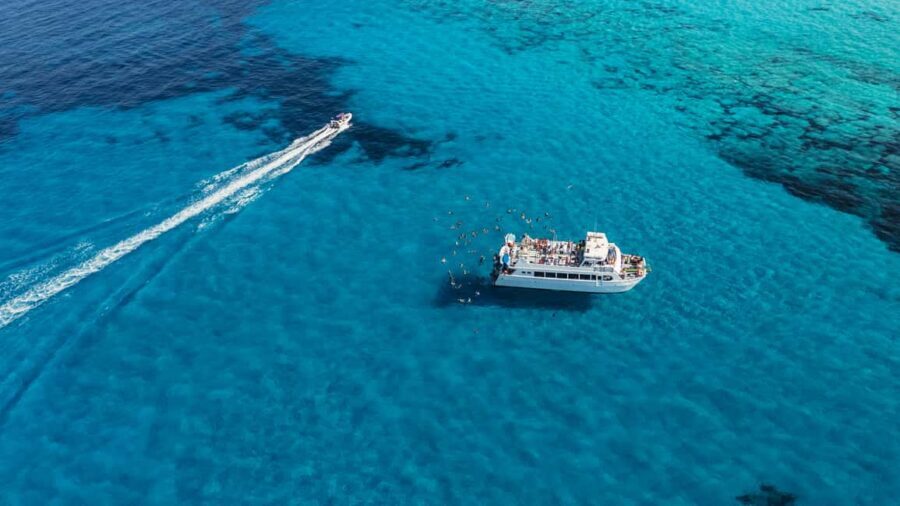 Ibiza: Formentera Boat Cruise with Paddle, Snorkel & Lunch - The stops that make the cruise: Espalmador and Ses Illetes from the water