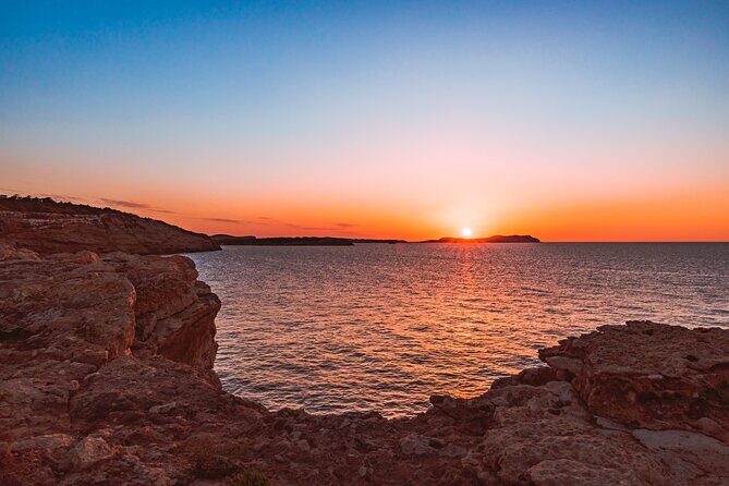 Ibiza Midday or Sunset Sailing with Light Snacks and Open Bar - The coast route: west-coast cliffs, calas, and one planned swim stop