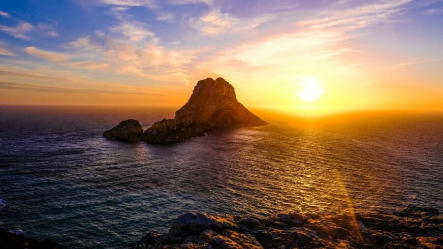 Ibiza: Midday or Sunset Sailing with Snacks and Open Bar - Anchor time in turquoise water: paddleboard, snorkel, and a swim platform