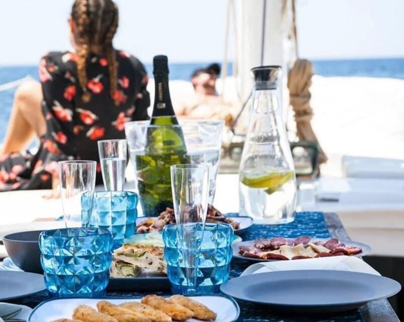 Ibiza: Private Sailboat with Premium Open Bar, Food & Music - Tapas, Snacks, and the On-Board Meal Setup