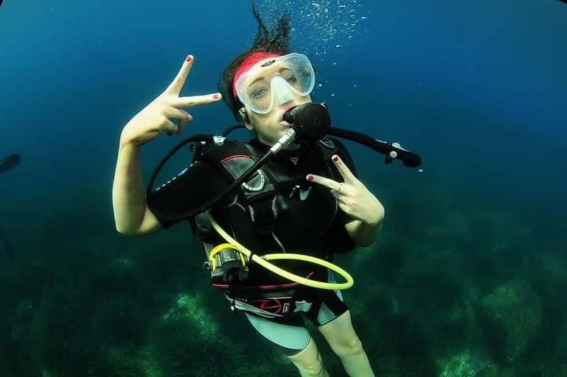 Ibiza Scuba Diving for Beginners and Snorkeling - Finding the Yellow Double-Decker Boat at Palapa Bar