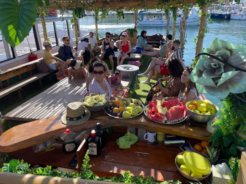 Ibiza: Sea Caves & Coves Snorkeling Paddle Boarding Tour - Amazonia Boat Details: Deck Comfort and a Jungle-Pirate Vibe
