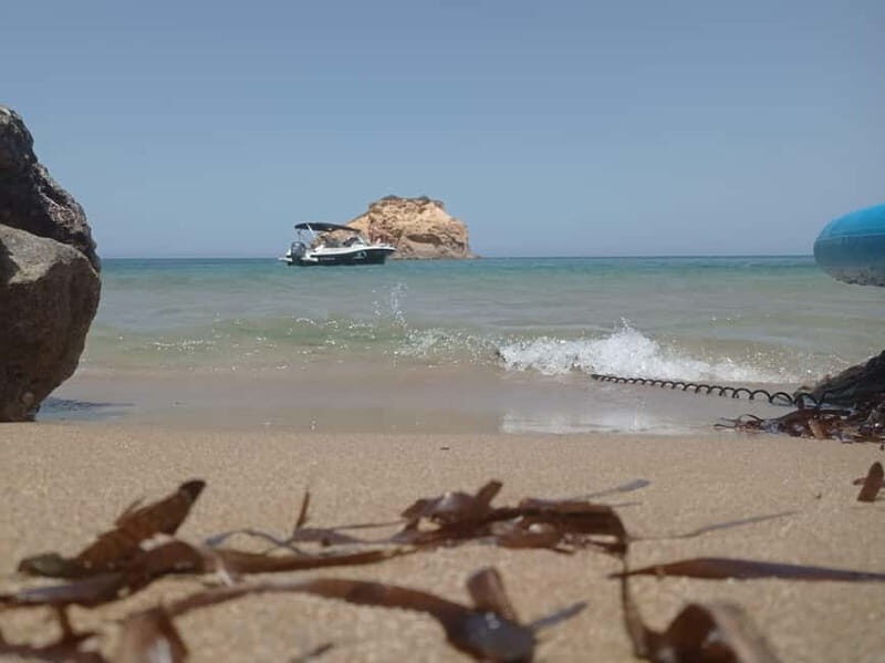 Ibiza: short "north of the island" tour from the sea in a private boat - Cala d’en Serra: the unfinished Sert building and street-art atmosphere