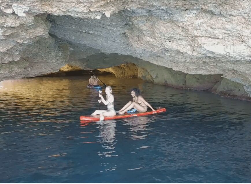 Ibiza: Snorkeling and SUP Paddle, Beach and Cave Boat Tour - Onboard vibe: drinks, music, roof deck, and crew energy