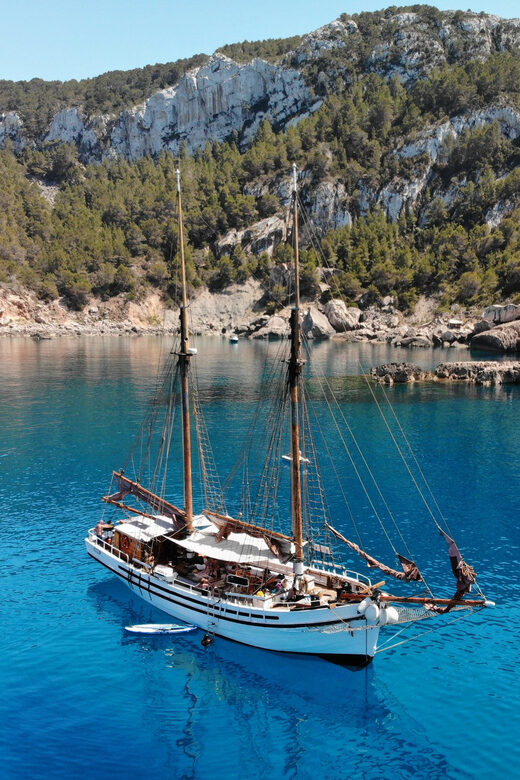 Ibiza Wooden Sail Boat Trip to Formentera - Lunch onboard: sangria de cava, bread and aioli, and seafood paella