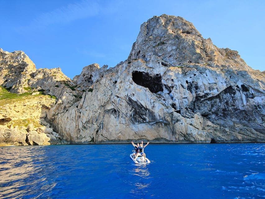 Jet Ski Tour to Es Vedra from San Antonio No license needed - The ride setup: boat transfer, safety briefing, then you drive
