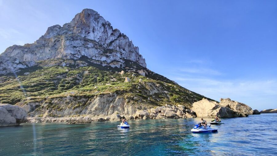 Jet Ski Tour to Es Vedra from San Antonio No license needed - Stop 1: Cala Comte—speed, photos, and guided sightseeing