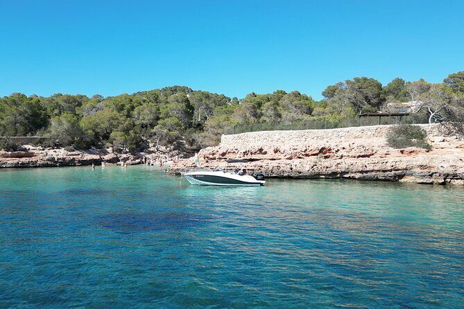 Private Boat Tour of San Antonio with Paddel surfing and Snorkeling - Stop 3: Cala Comte for a longer swim (about 1 hour)