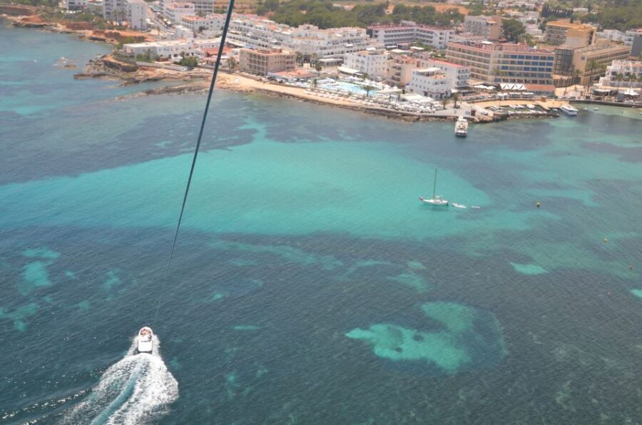 Santa Eulària des Riu: Parasailing Boat Cruise with Drinks - Boat vibes: music, drinks, and the crew’s photo support