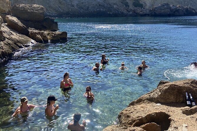 Secret Cove Yoga and Crystal Waters Experience in Ibiza - Cliff Photos First, Then a Hidden Cove Change of Scene