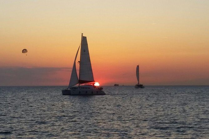 Sunset Catamaran Expedition in front of Cafe Mambo - From Club Nàutic San Antonio to open water at 1:30 pm