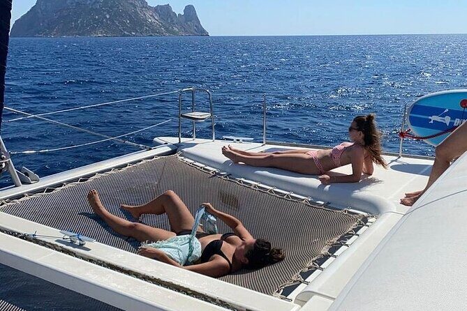 Sunset on a catamaran: from Es Vedrá to Cala Conta - Cala Llentía, the gates, and the Time and Space sundial